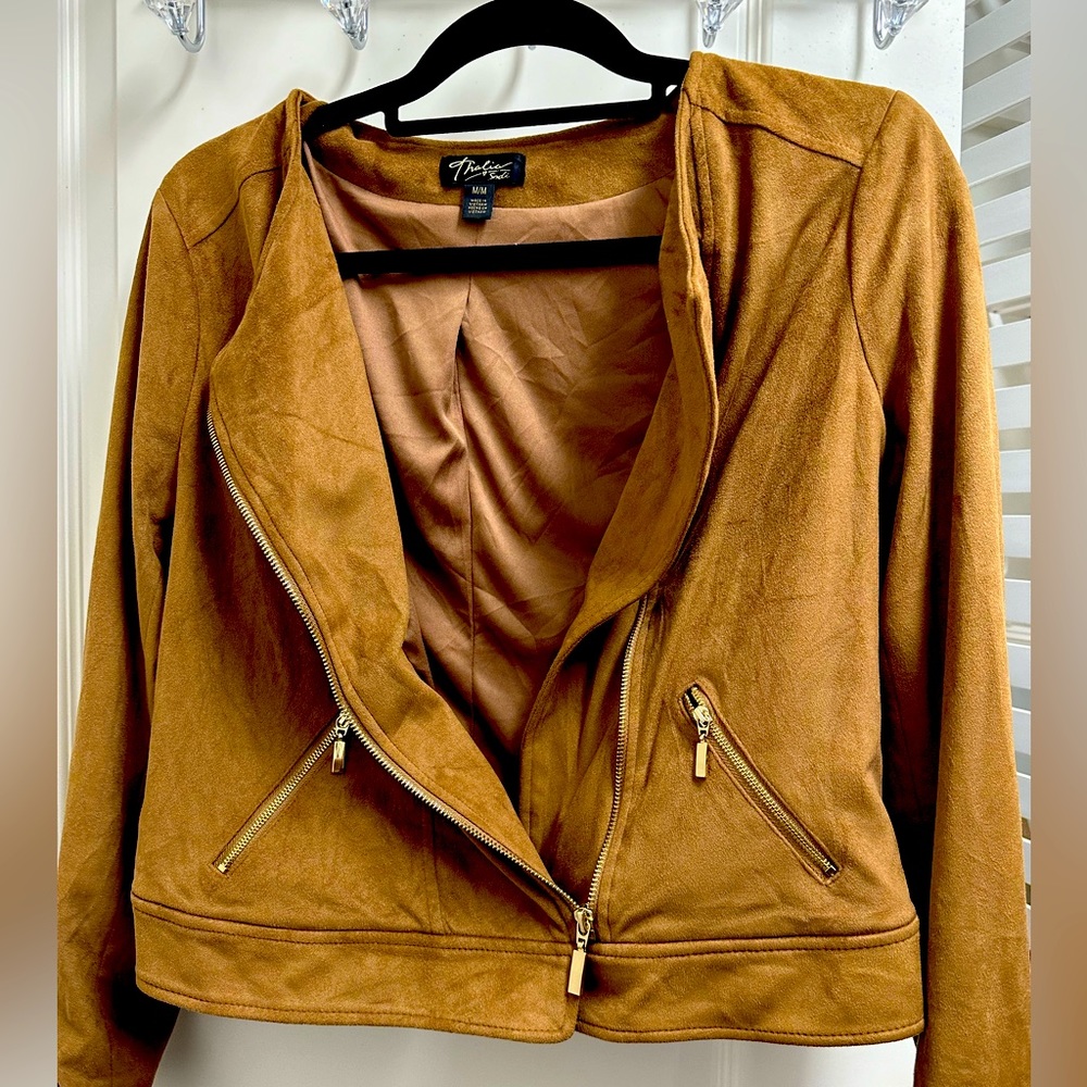 Faux Suede Brown Caramel with gold zipper, this jacket is super flattering SZ M